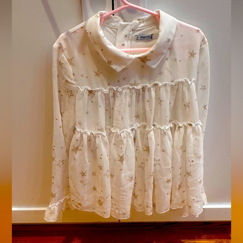 White blouse with gold star from a Spanish company called Mayoral. Size 9